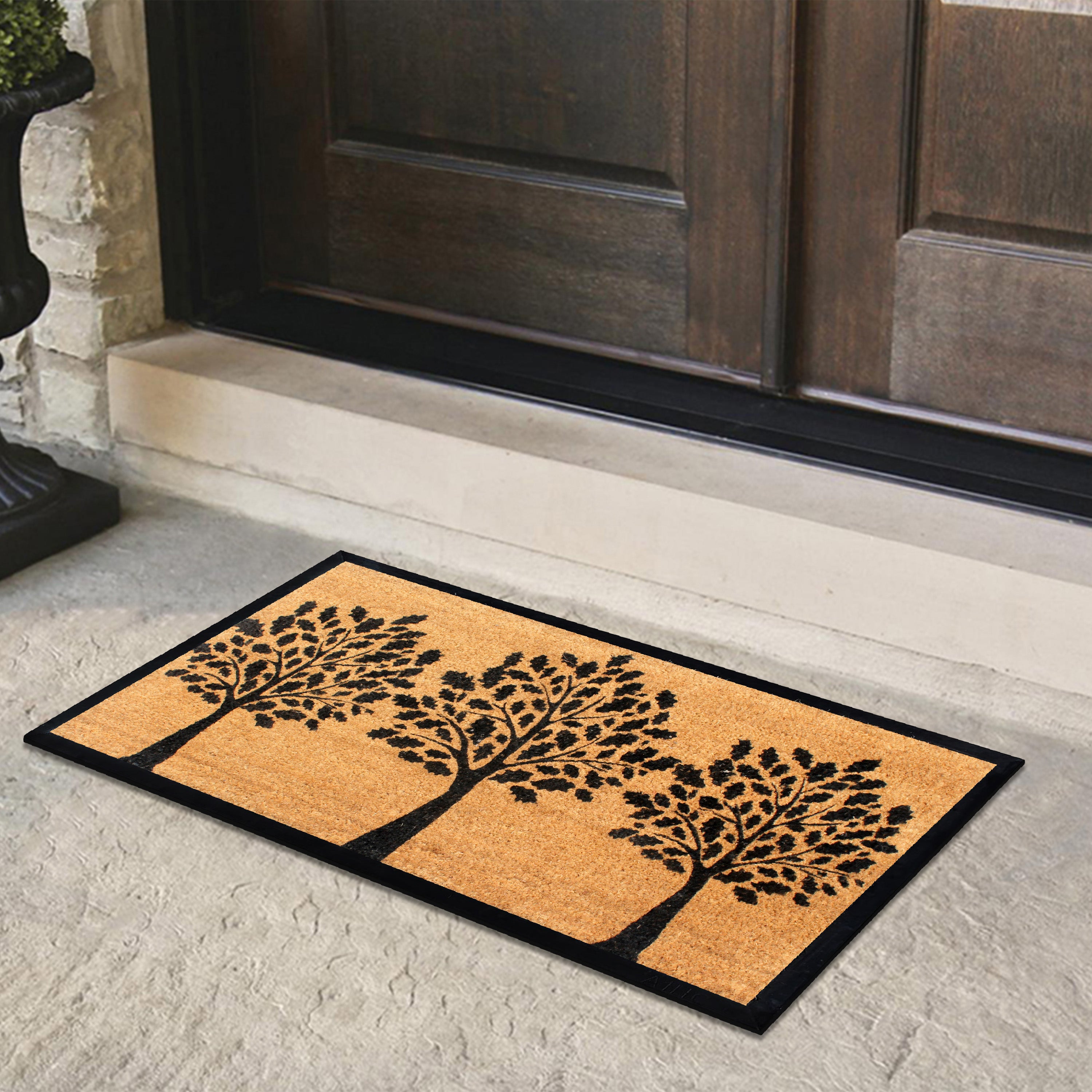 natural coir doormat with decorative tree pattern