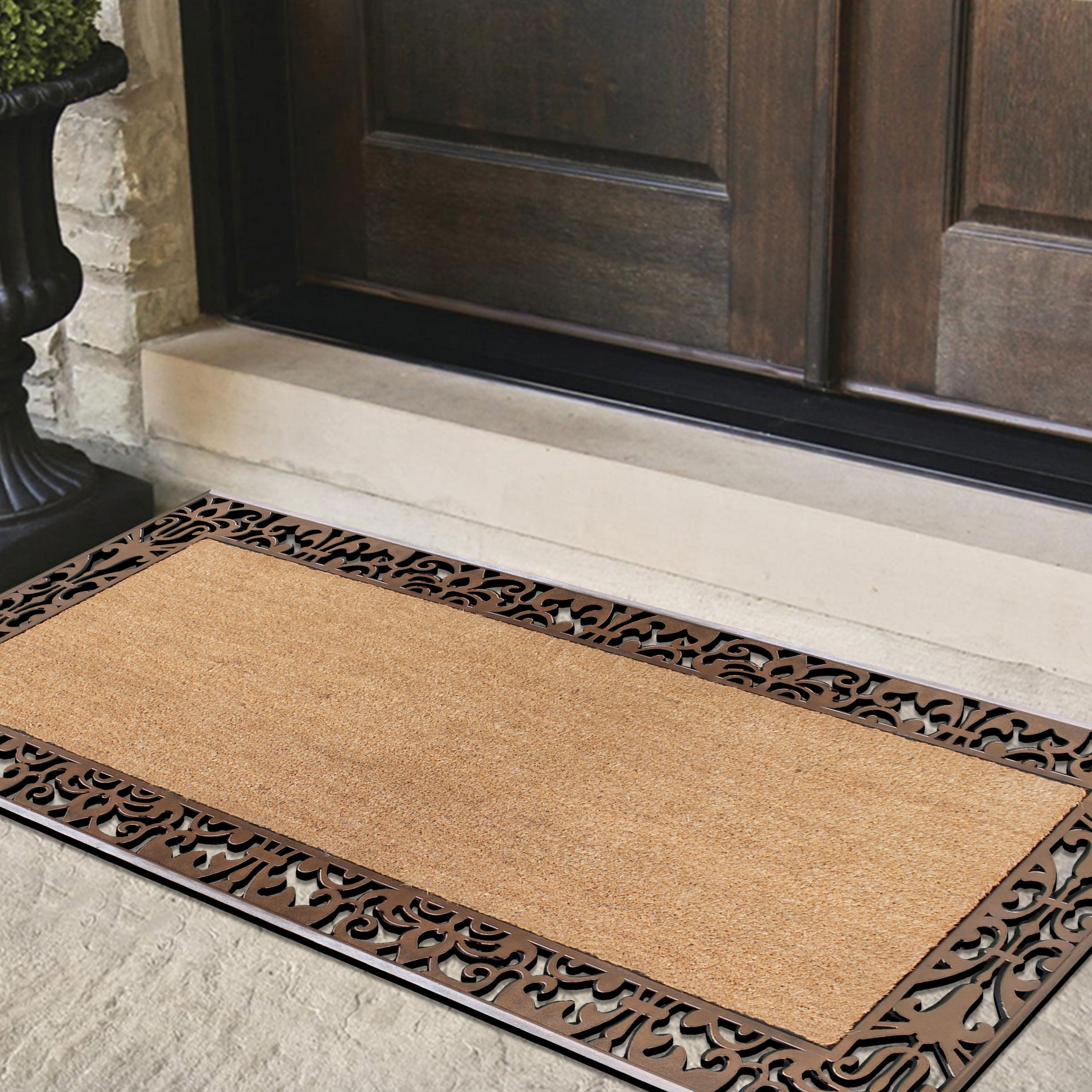 Outdoor entry mat with natural coir center and rubber frame