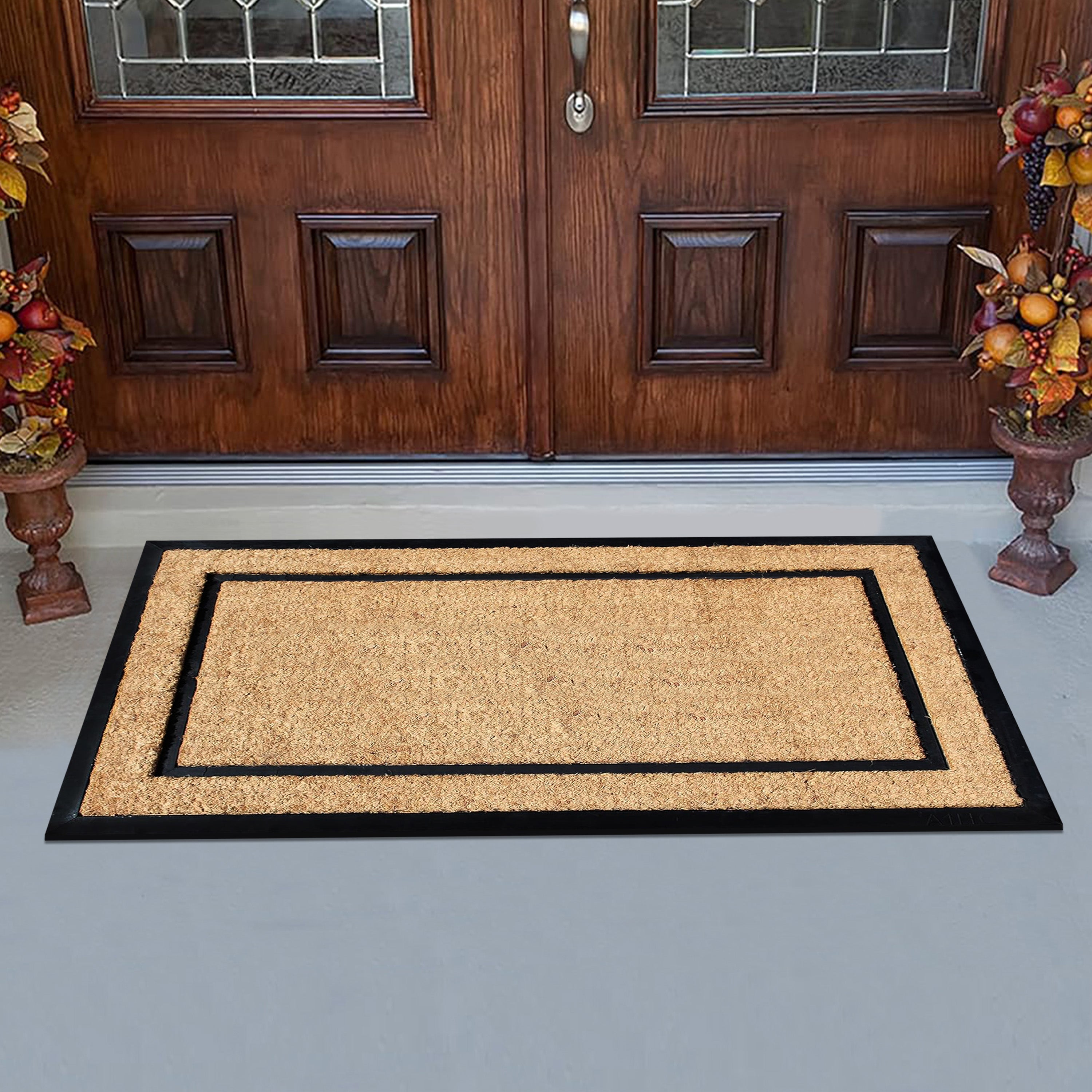 Natural coir front door mat with black border design