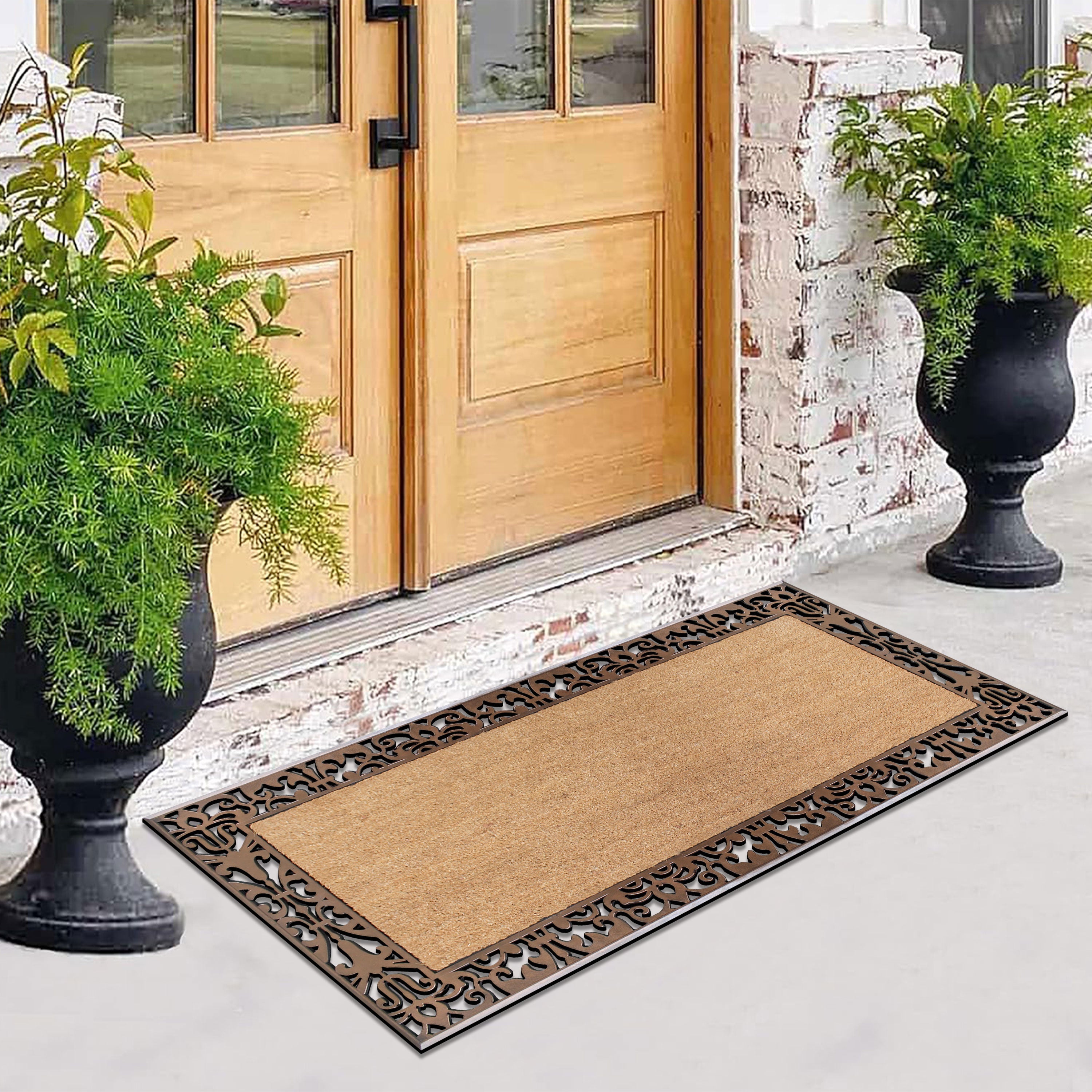 Decorative outdoor door mat with patterned rubber border