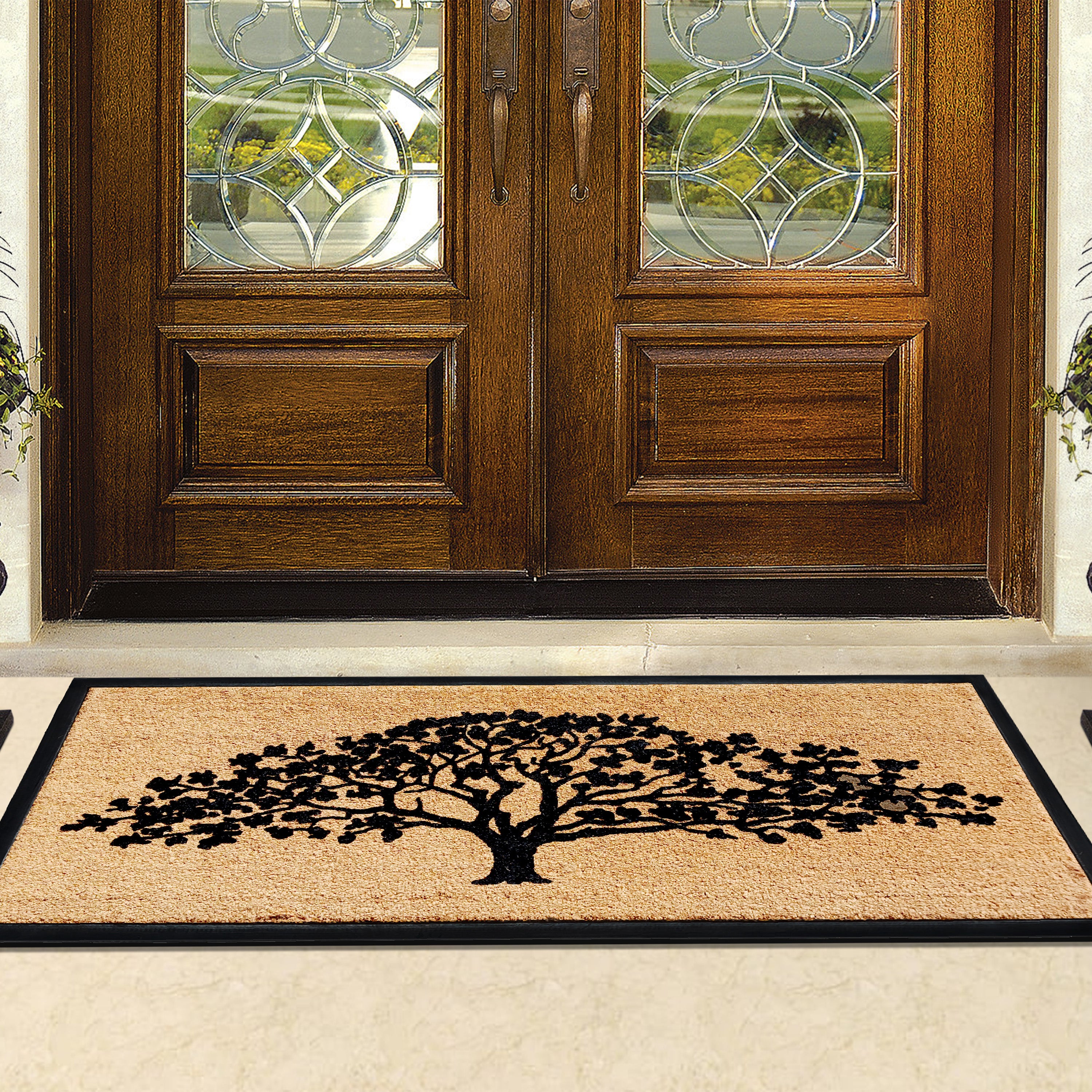 weather resistant doormat with tree design